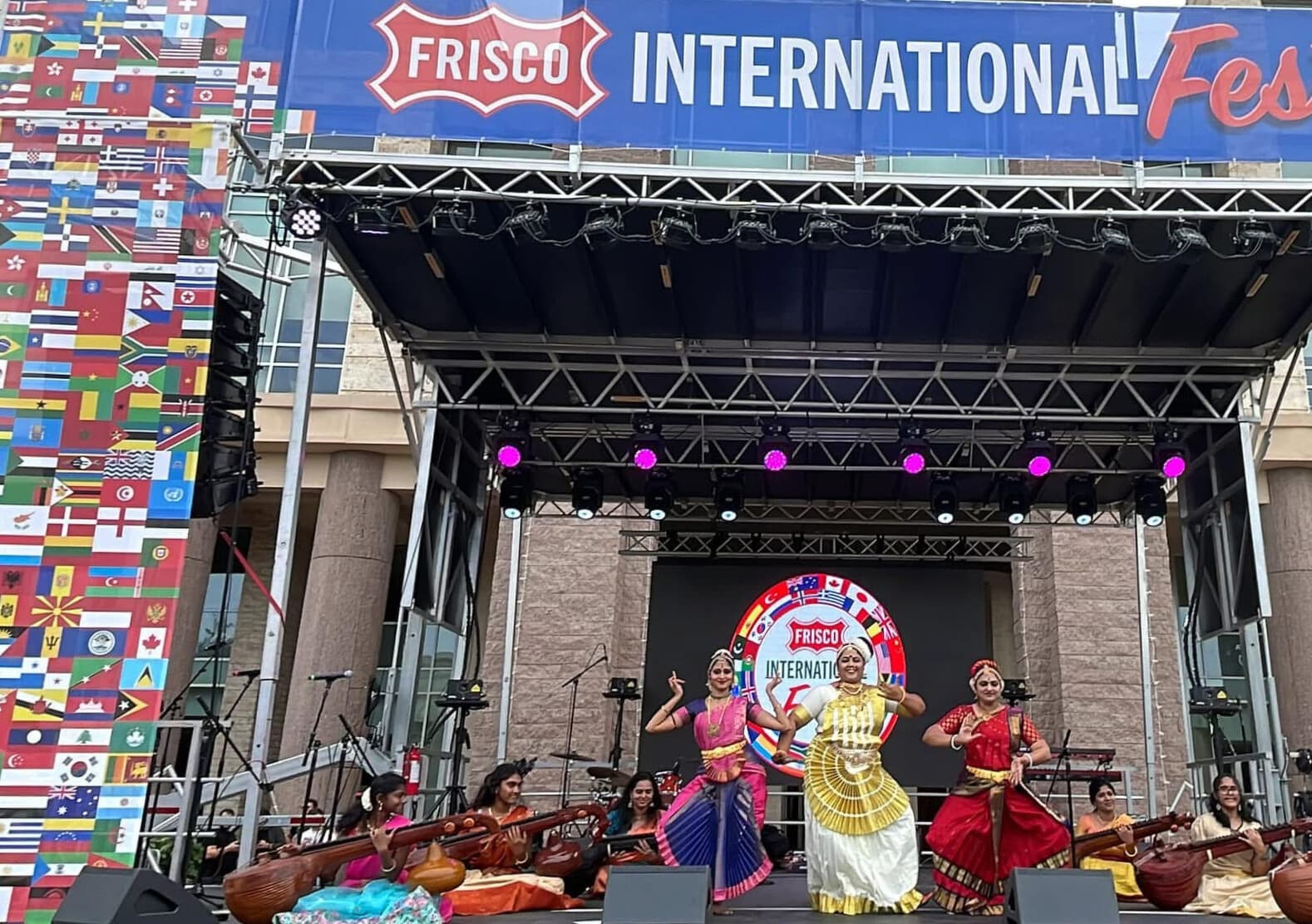 Traditional Indian dancers and musicians perform on stage at the Frisco International Festival.